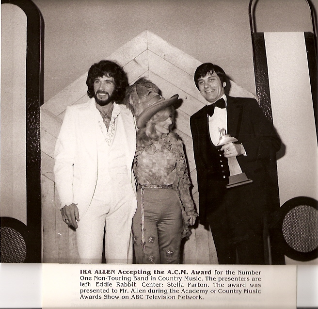 Ira accepting ACM Award 1977 from Stella Parton & Eddie Rabbit